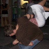 Looks like I'm trying to judo throw Charissa! Cool!