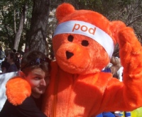 Hugging the orange "poo" bear at semester 2 uq market day