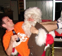 About to pick up Adam and throw him off the building...... I was a BADDD santa.   :)