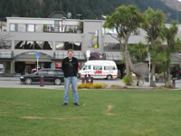 Me with a stone Moa statue in the background